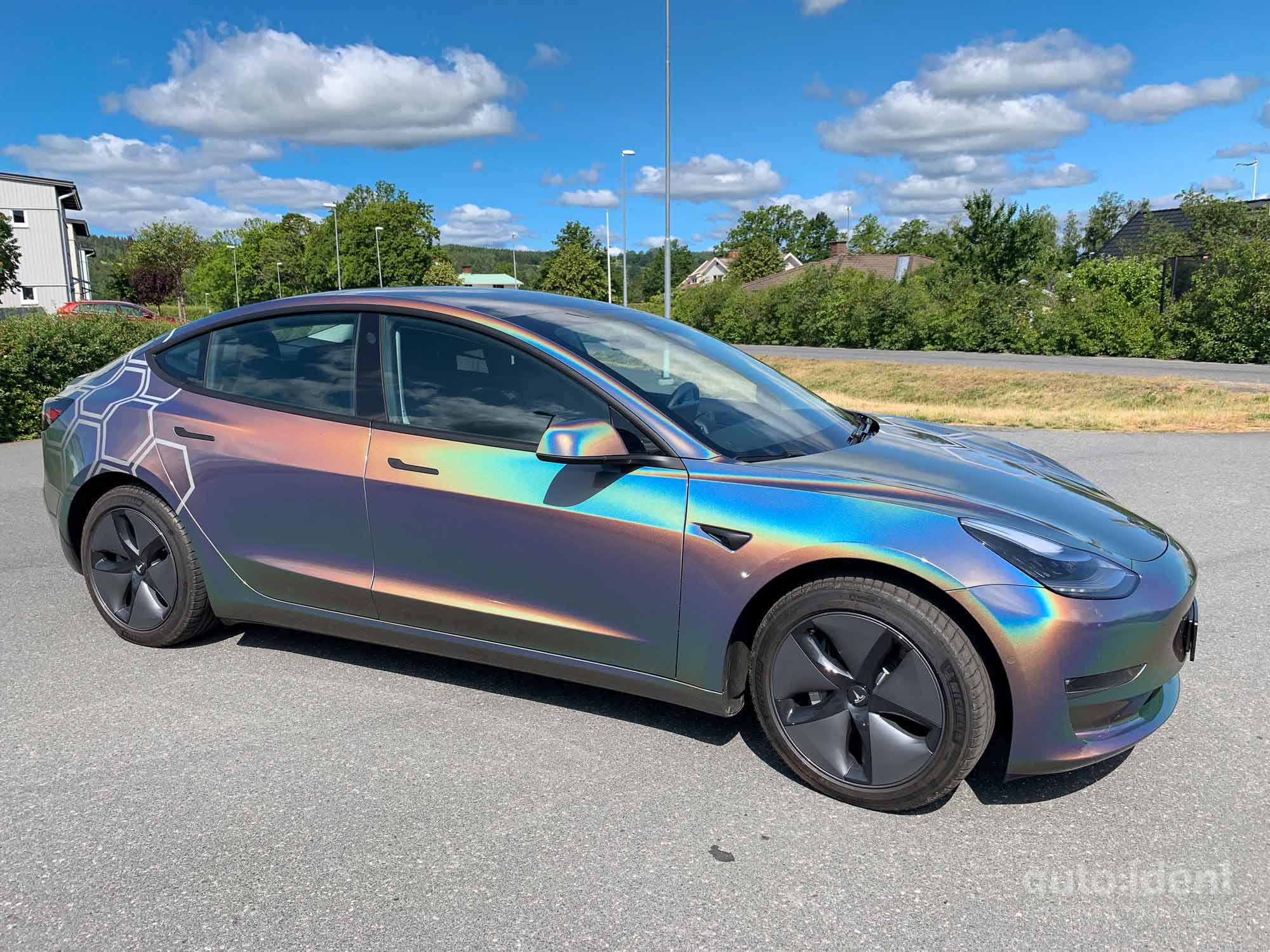 Tesla model 3 psychedelic wrap