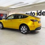 Tesla Model Y - Yellow energetic